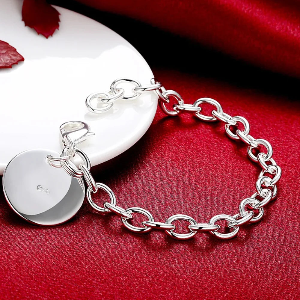 Bracelet de marque rond simple et tendance en argent sterling 925, idéal pour un port quotidien et cadeaux d’anniversaire ou de fêtes.