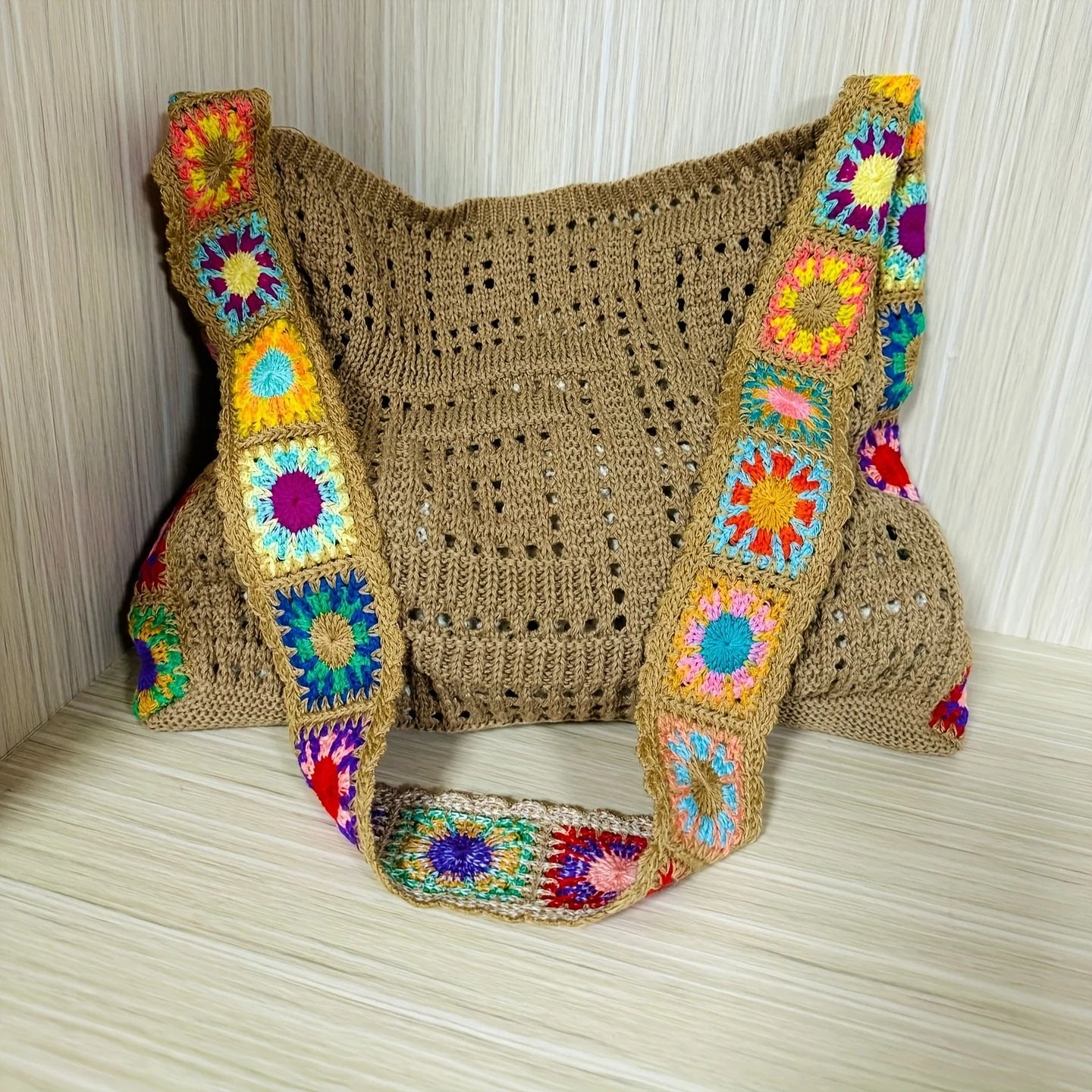 Sac bandoulière bohème en effet crochet, ultra tendance. Parfait pour un look festival ou casual. Livraison rapide AliExpress.
